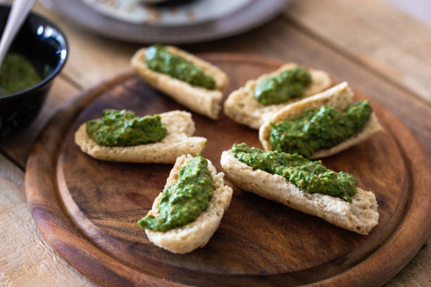 istock Tosted bread slices with spinach pesto 1151047444