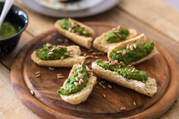 istock Tosted bread slices with spinach pesto 1151047545