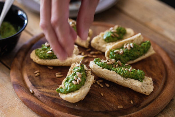 istock Tosted bread slices with spinach pesto ad sunflower seed 1151047599