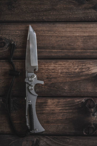 istock knife on wooden background 1151049598