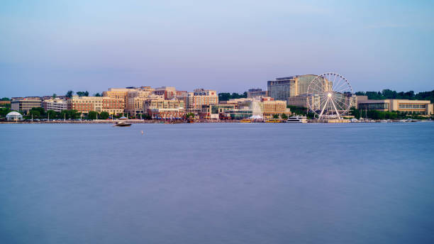 National Harbor Maryland Long exposure photo of the National Harbor in Oxon Hill, Maryland national landmark stock pictures, royalty-free photos & images