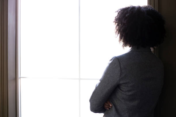 istock Business Woman Thinking by the Window 1151059715