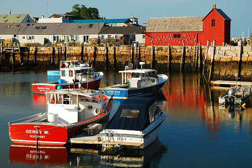 tRockport, MA, USA August 20, 2009 Lobster Boats Docked in a calm harbor near Motif Number 1 in Rockport, Massachusetts