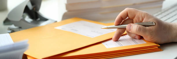 istock Businessman hold hand silver pen. 1151066716