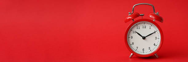 istock Red alarm clock show 10 hour vintage modern 1151067101