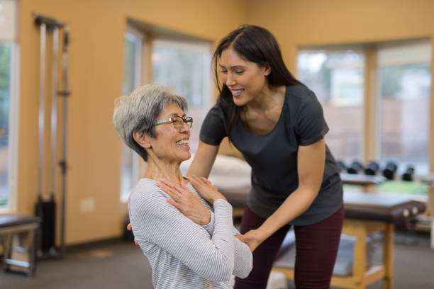 istock A senior woman works with her occupational therapist 1151067635