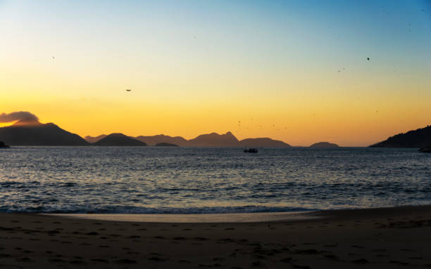 istock Sunrise on Praia Vermelha Beach, Rio de Janeiro 1151070695