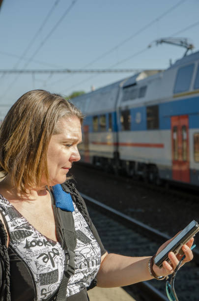 istock Woman waiting for train 1151080529