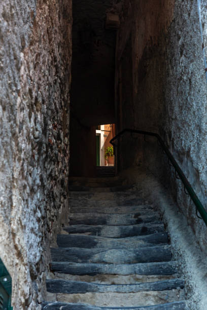 istock Narrow city passage between the houses 1151096503