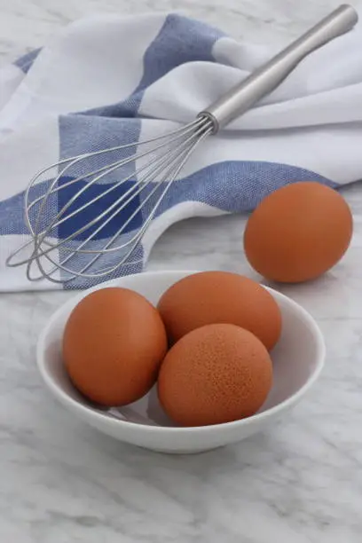 fried eggs or scrambled eggs ingredients on a lovely set up