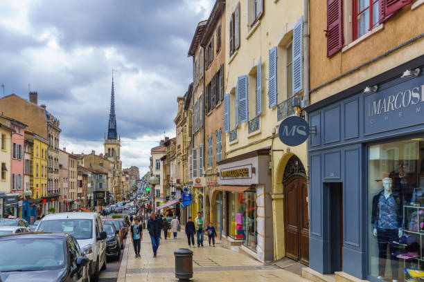 Main street and the church in Villefranche-sur-Saone, Beaujolais stock photo