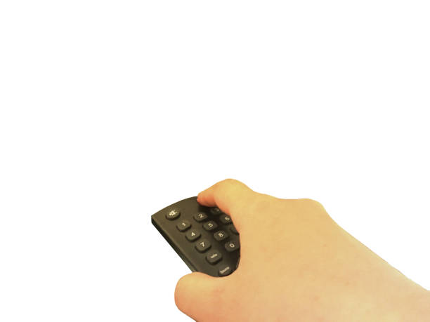 istock Hand holding and press power button on remote control isolated on white background 1151104637