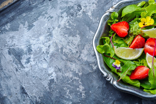 istock Summer salad with strawberries 1151104916