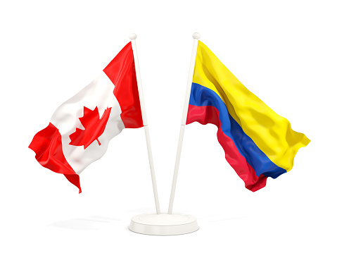 Two waving flags of Canada and colombia isolated on white. 3D illustration