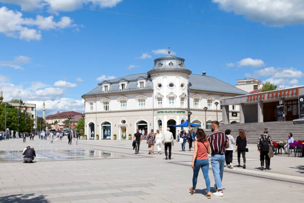 Skanderbeg square in Pristina Pristina, Kosovo - May 22 2019: Skanderbeg square with its fountain and the National Theater. kosovo stock pictures, royalty-free photos & images