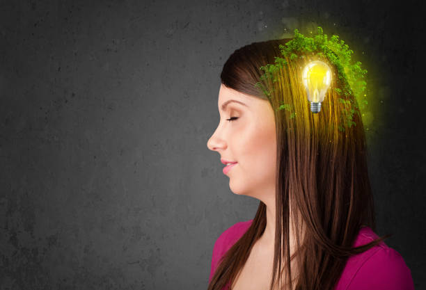 istock Young mind thinking of green eco energy with lightbulb 1151114823