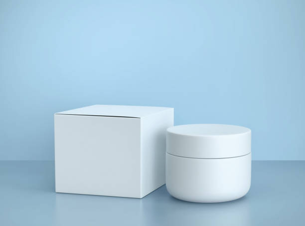istock White cosmetic jar of face cream and box 1151116038