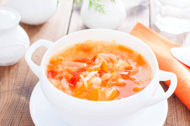 istock vegetable soup with onions and cabbage for onion diets in a white bowl, horizontal 1151117064