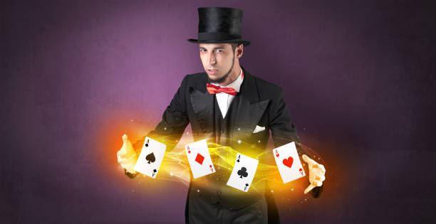 istock Illusionist making trick with magical play cards 1151117092