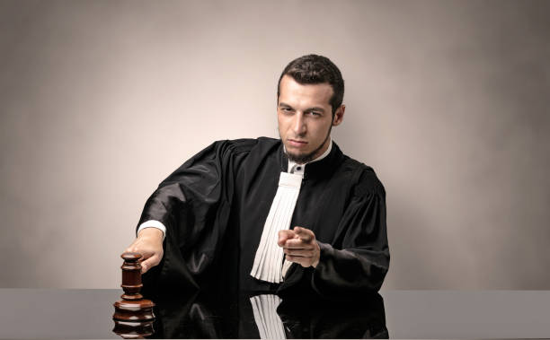 istock Oldscool young judge in gown 1151117345