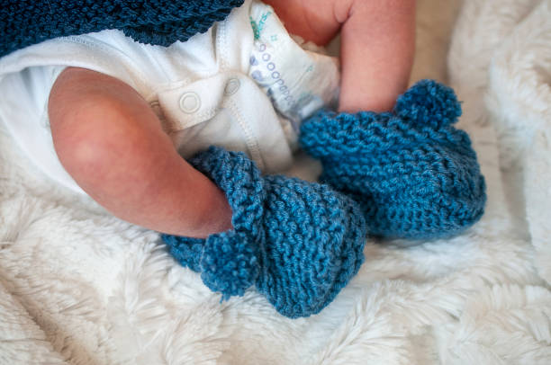 istock Tiny foot of newborn baby 1151118704