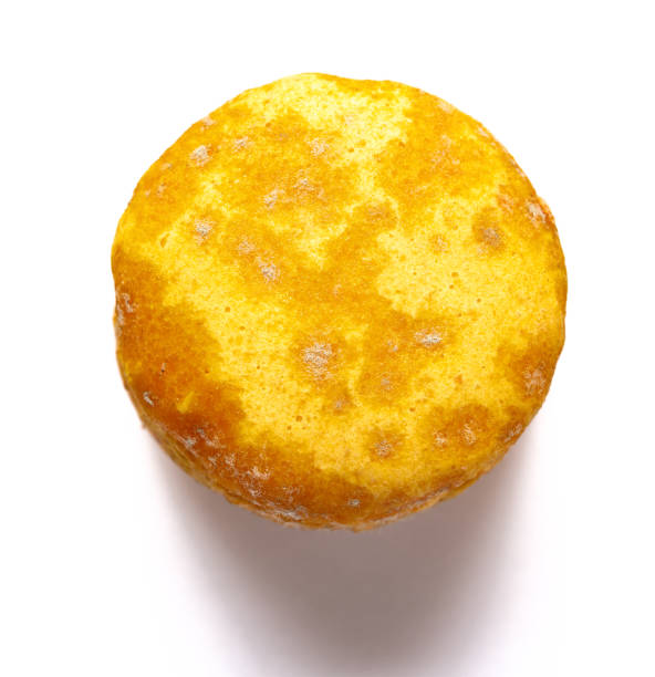 istock top view yellow moldy macaroon on a white background 1151121174