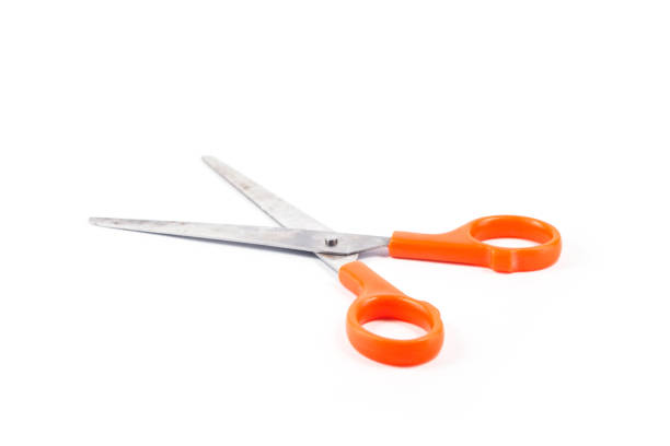 istock Close-Up Of Scissor Over White Background 1151130287