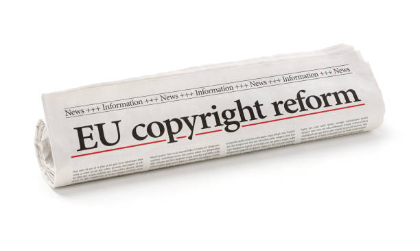 istock Rolled newspaper with the headline EU copyright reform 1151131372