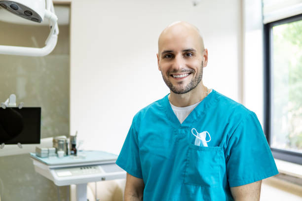 istock Young dentist in his dental clinic 1151133785