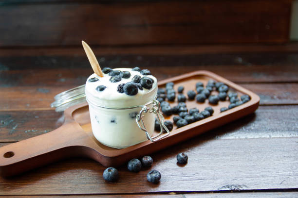 istock Blueberries in fresh organic yogurt in glass 1151134405