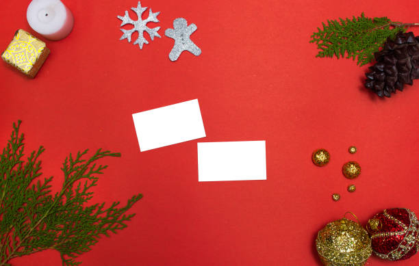 istock Computer laptop mobile display on table with isolated white screen for mockup in Christmas time. Christmas tree, gifts, decorations in background. 1151135466