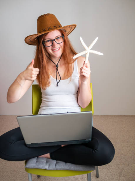 istock Book a holiday successfully with a laptop 1151135840