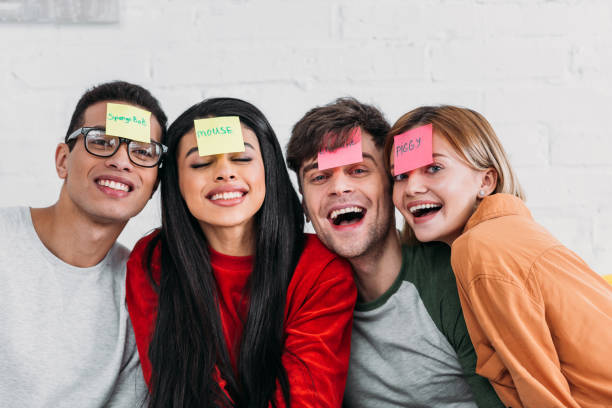 istock multicultural friends with funny nickname labels on foreheads 1151139906