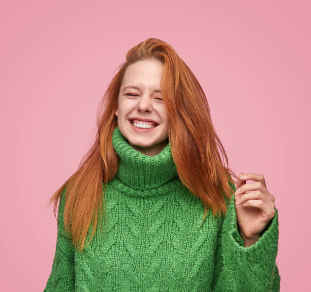 istock Cheerful woman with closed eyes 1151141563