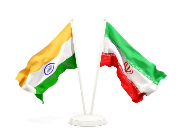 istock Two waving flags of India and iran isolated on white 1151141981