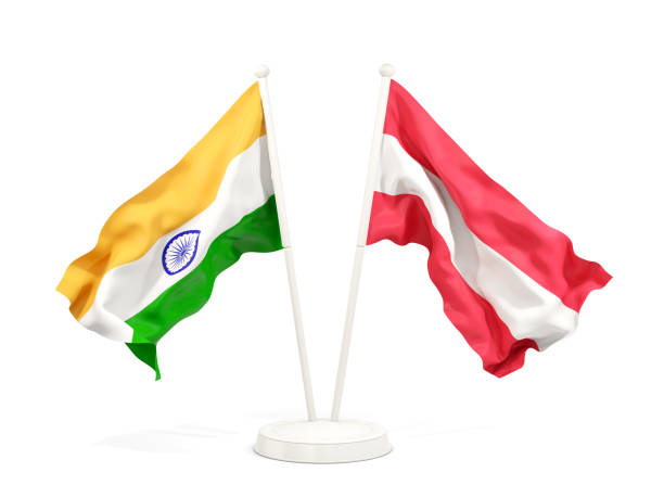 istock Two waving flags of India and austria isolated on white 1151142230