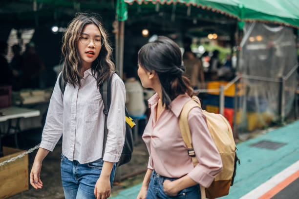 istock Young women students on the street 1151144312