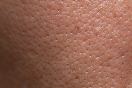 closeup male skin pores with face hire macro detail