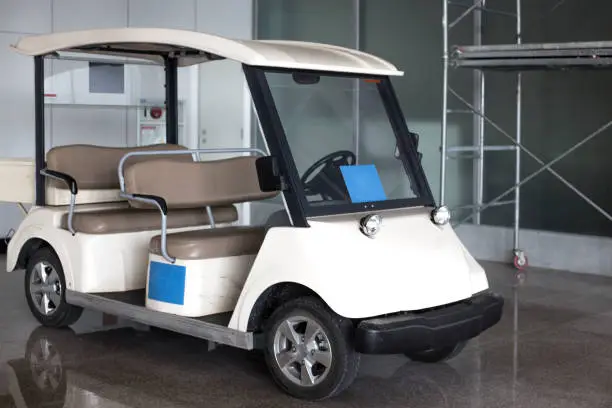 white golf cart golfcart isolated