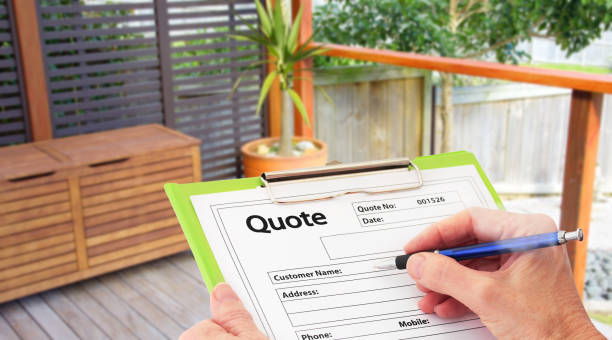 istock Hand Writing a Quote for Home Deck Building 1151147943