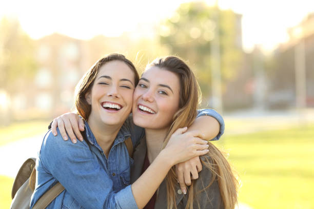 istock Happy best friends posing looking at camera in a park 1151149151