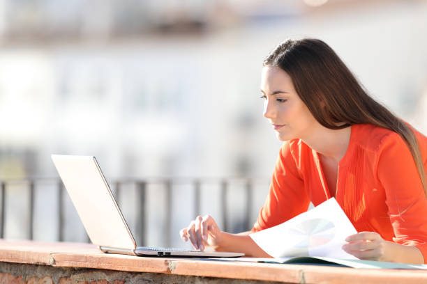 istock Self employed working with laptop and charts 1151149386