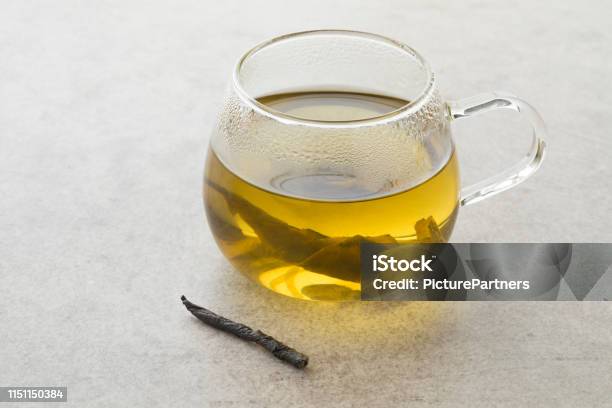 Cup Of Chinese Kuding Tea Stock Photo - Download Image Now - Chinese Culture, Cup, Dried Food