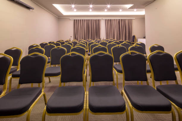 istock Seminar presentation. Empty conference room, lots of empty seats. Auditorium for workshops and seminars. Brown color. 1151150577