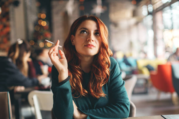Young woman in café stock photo