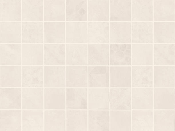 istock Beige square ceramic mosaic tiles texture background. 1151153759