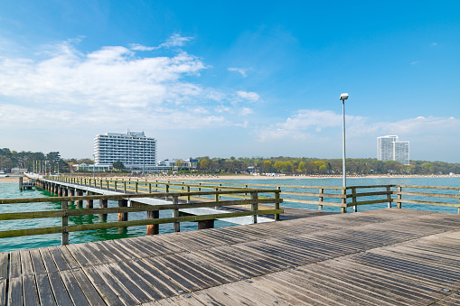 View on the pier on the coast in Timmendorfer Strand, Germany