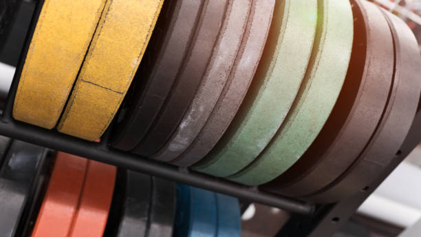 Close-up row of coloured discs in a gym