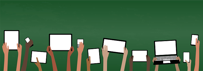 BYOD Banner Concept Bring Your own Device children hands holding computer tablet and smartphone devices by Green Chalkboard with copy space EPS10 Grouped Objects