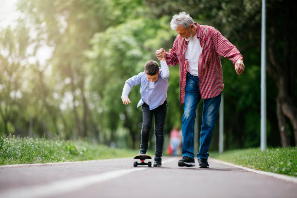 istock Little boy trying skateboard 1151162274